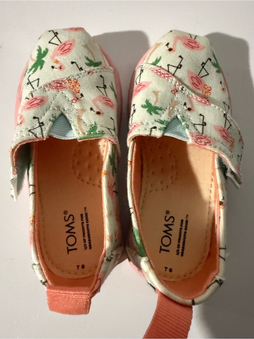 TOMS Kids Flamingo Strap Slip-Ons in Pink and Green